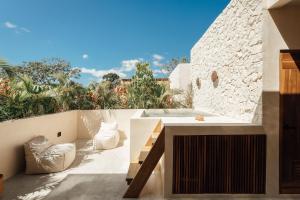 Posezení v ubytování Satori Tulum