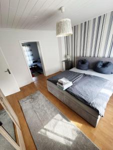 Katil atau katil-katil dalam bilik di Duplex Schlafzimmer in Haus