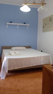 Postel nebo postele na pokoji v ubytování Mazzini House