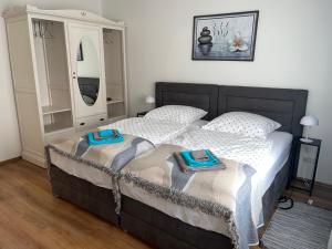 Postel nebo postele na pokoji v ubytování Apartment Nähe Messe Philharmonie, Rüttenscheid,Uniklinikum