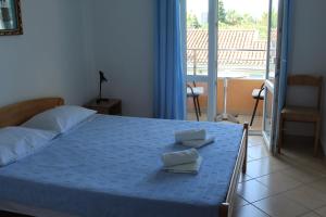 Postel nebo postele na pokoji v ubytování Apartments Bovan