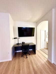 Μια τηλεόραση ή/και κέντρο ψυχαγωγίας στο Luxury DreamStay Miami 3BED 2BATH King Suite