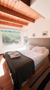 En eller flere senge i et værelse på Odella Casas de Montaña en Vallecitos