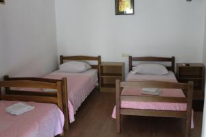 Postel nebo postele na pokoji v ubytování Apartments Bovan