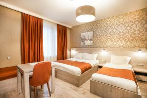 Letto o letti in una camera di 1 Hotel Borjomi