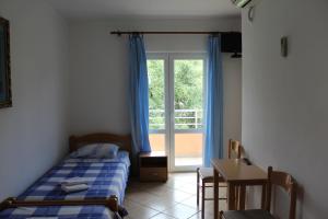 Postel nebo postele na pokoji v ubytování Apartments Bovan