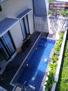 Billede fra billedgalleriet på Villa Kusuma Pinus 3 Bedroom with Pool i Batu