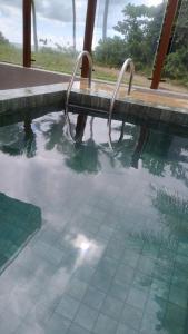 Bazén v ubytování Beira Mar de João Pessoa, paz, tranquilidade e lazer nebo v jeho okolí