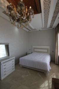 Ліжко або ліжка в номері 3 Appartements Vue sur Mer dans une maison indépendante