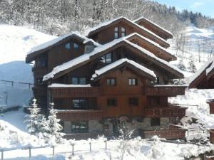 Résidence Fermes De Meribel Daguet - Appartement 3 pièces 6 personnes à Méribel Village aux pieds des pistes avec accès à la piscine couverte MAE-2020 v zime + 4 fotografie