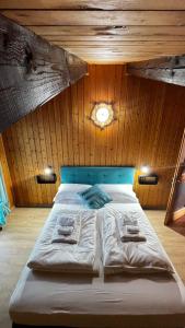 Postel nebo postele na pokoji v ubytování Silvydolomitiapartment