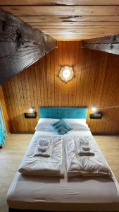 Postel nebo postele na pokoji v ubytování Silvydolomitiapartment