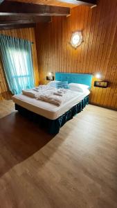 Postel nebo postele na pokoji v ubytování Silvydolomitiapartment