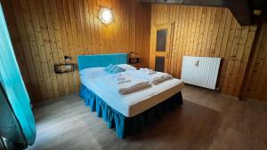 Postel nebo postele na pokoji v ubytování Silvydolomitiapartment
