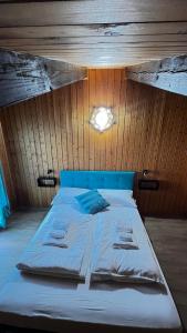 Postel nebo postele na pokoji v ubytování Silvydolomitiapartment