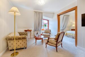 TV a/nebo společenská místnost v ubytování Hotel Hoffmeister