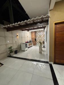 Η κουζίνα ή μικρή κουζίνα στο Casa Linda Peró +3 φωτογραφίες