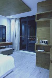 Ліжко або ліжка в номері 3 Appartements Vue sur Mer dans une maison indépendante