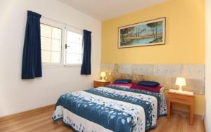 Una cama o camas en una habitación de Arguineguin apartment terrace swimming pool 16 fotos más