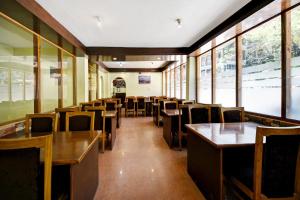 Posezení v ubytování Hotel O Tridev + 37 fotografií