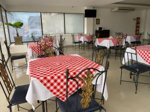 Restoran või mõni muu söögikoht majutusasutuses Hotel Metropolis Plaza Cali