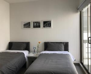 Postel nebo postele na pokoji v ubytování Beautiful 3-bedroom house 12 min to Queretaro downtown + 20 fotografií