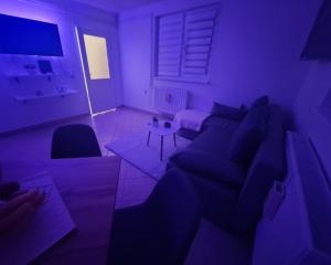 a living room with a couch and a table at Irina in Zagreb