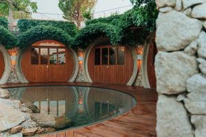 Bazén v ubytování El Riad de l'Empordà nebo v jeho okolí