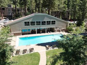 an aerial view of a house with a swimming pool at Raccoon Roost condo in Incline Village