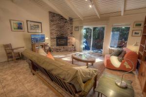 a living room with a couch and a fireplace at Sugar PIne home in Incline Village