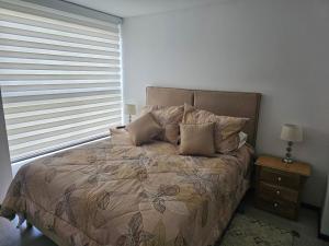 Postel nebo postele na pokoji v ubytování departamento amoblado + 6 fotografií