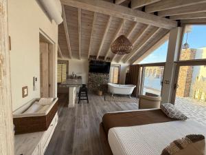 Ένα ή περισσότερα κρεβάτια σε δωμάτιο στο Cabañas San Antonio +29 φωτογραφίες