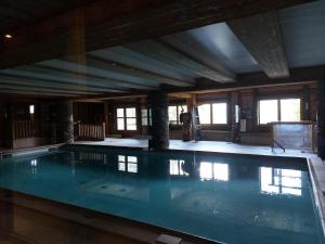 Basen w obiekcie Résidence Roselend - Charmant appartement de 3 pièces situé dans une résidence au village du Chantel, proche des pistes et avec piscine. MAE-2474 lub w pobliżu