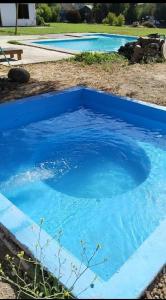 Bazén v ubytování Cabaña con jacuzzi Olmué nebo v jeho okolí