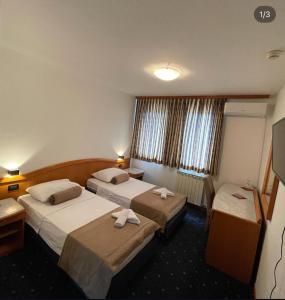 Postel nebo postele na pokoji v ubytování Hotel Previla