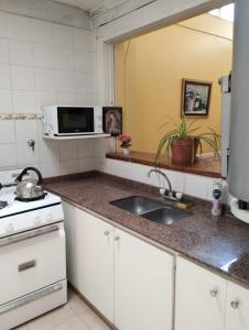 Kuchyň nebo kuchyňský kout v ubytování Portal del Huesped + 8 fotografií