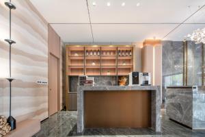 Galería fotográfica de 沃德酒店郑州大学高新校区店 en Zhengzhou