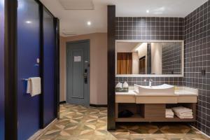 Un baño de 沃德酒店郑州大学高新校区店