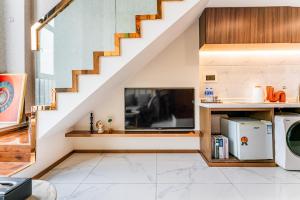 Kuchyň nebo kuchyňský kout v ubytování 云享城居 SKY高空Loft公寓酒店 春熙路九眼桥店