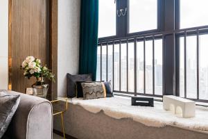 Posezení v ubytování 云享城居 SKY高空Loft公寓酒店 春熙路九眼桥店