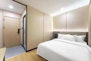 Foto dalla galleria di World Smart Hotel Shandong Cancer Hospital Branch a Jinan