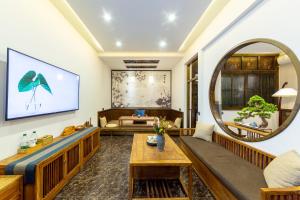 Posezení v ubytování Pingyao Harmony Hotel