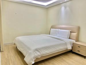 City Center Executive Hotel-Near Manila Airport and PITX客房内的一张或多张床位