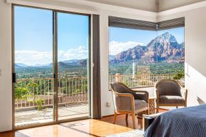 a bedroom with a view of the mountains at Sedona Luxury with 75’ Lap Pool, Hot Tub & Breathtaking Vortex Views in Sedona