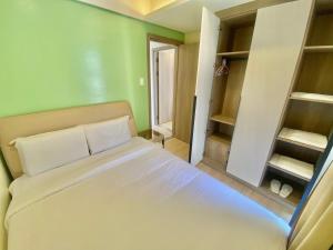 City Center Executive Hotel-Near Manila Airport and PITX客房内的一张或多张床位