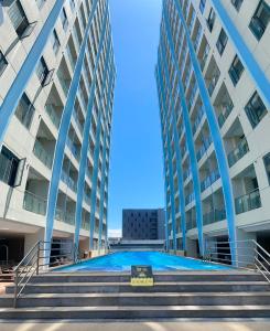 Bazén v ubytování City Center Executive Hotel-Near Manila Airport and PITX nebo v jeho okolí