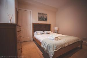 Ένα ή περισσότερα κρεβάτια σε δωμάτιο στο Apartment B