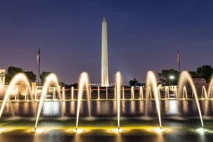 a group of water fountains in front of the washington monument at WELL-EQUIPPED STUDIO APT - WALK TO METRO SUBWAY in Washington, D.C.
