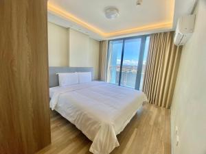 City Center Executive Hotel-Near Manila Airport and PITX客房内的一张或多张床位