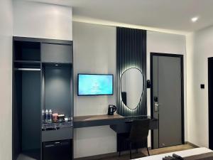 TV a/nebo společenská místnost v ubytování LION 15 Hotel